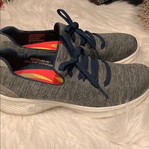 Sketchers slip on walking sneakers